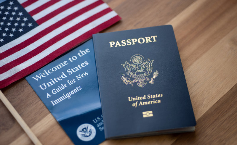Passport and U.S. of A. flag